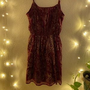 red dress with gold flower detail